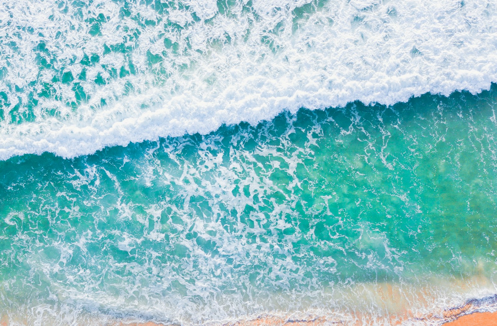 Aerial of turquoise whitewater