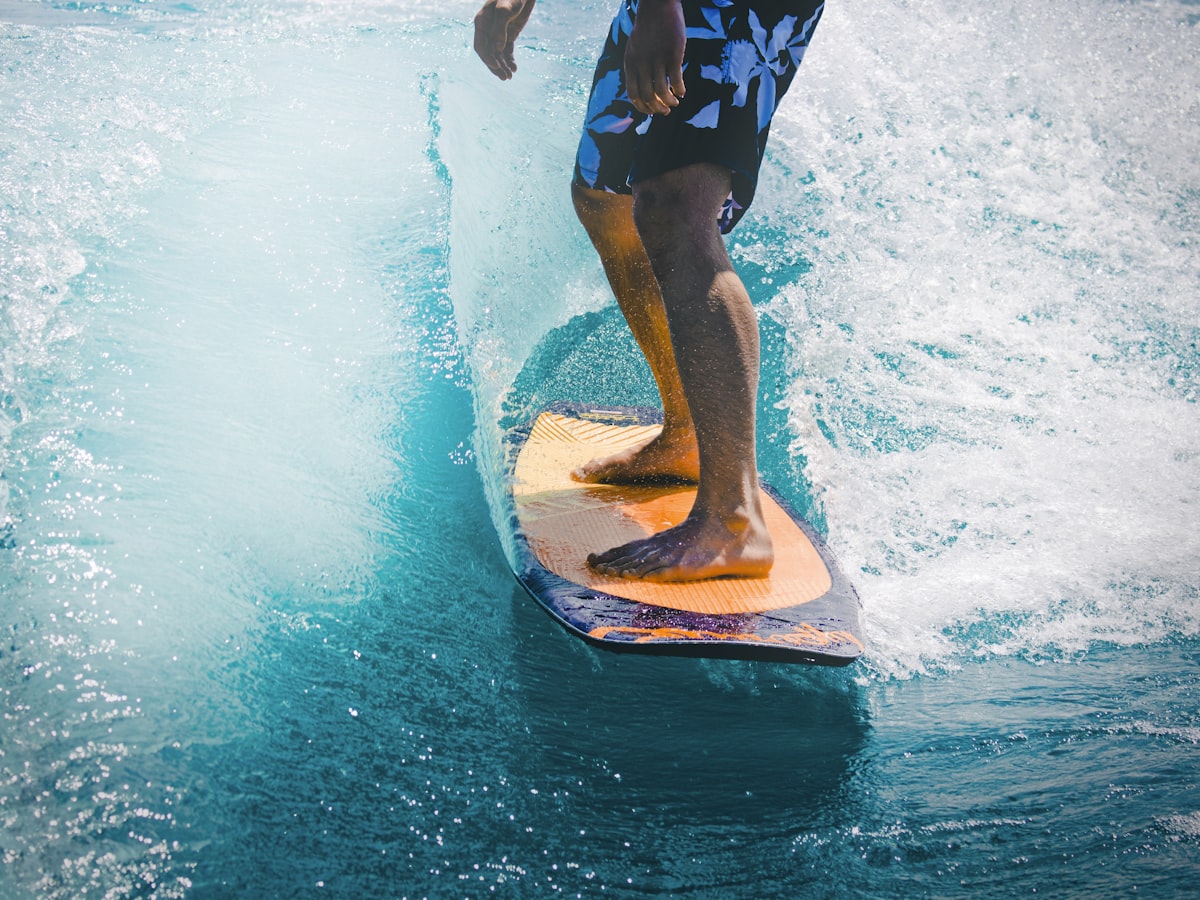 Rider cruising a mini mal longboard